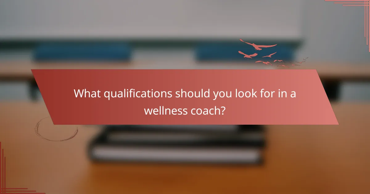 What qualifications should you look for in a wellness coach?